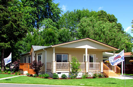 New Manufactured home with nice roof lines and carport on private land